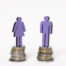 man woman standing equal piles coins